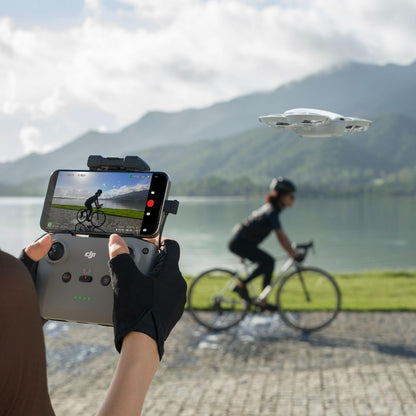 DJI Osmo Action 5 Pro Adventure Combo – 4K Actioncam, 1/1,3" Sensor, 12 Std. Akkulaufzeit (3 Akkus), Dual OLED-Touchscreens, ideal für Reisen & Vlogs
